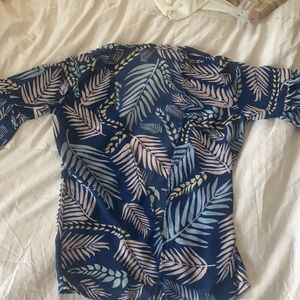 Girls sheer bathing suit cover up or kimono. Tropical pattern.